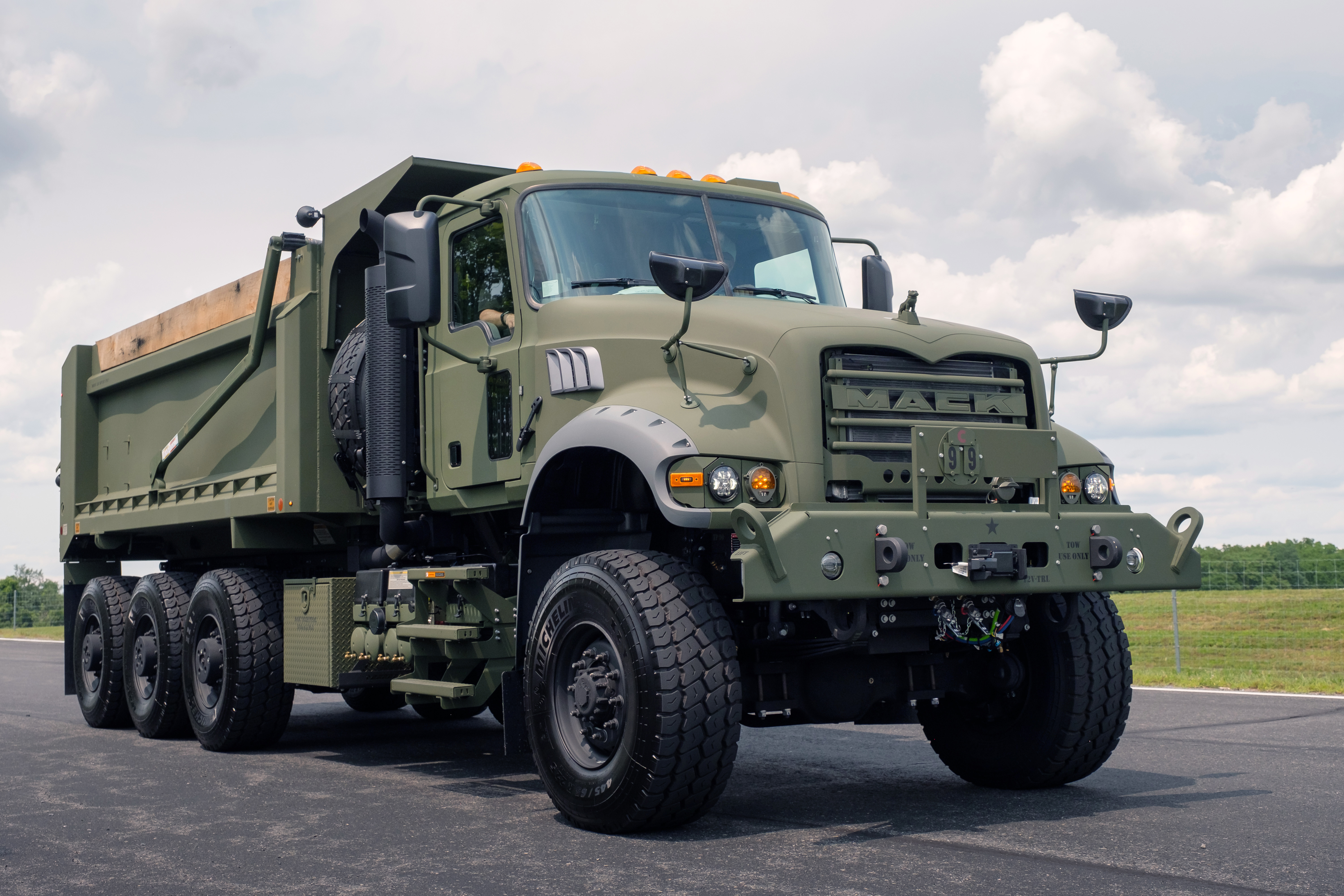Mack Defense Presents First Production M917A3 Heavy Dump Trucks to